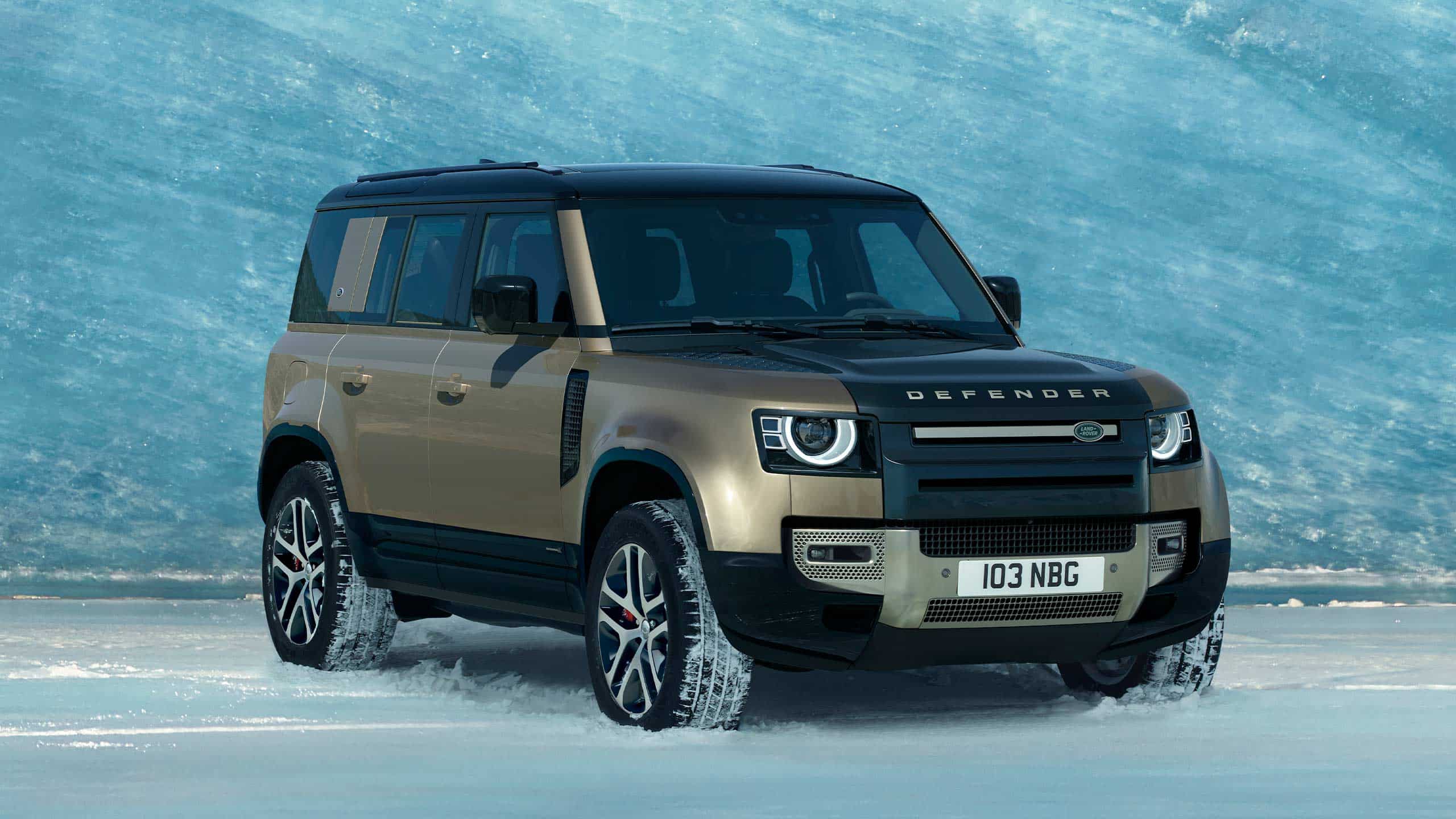 Land Rover Defender in snow background