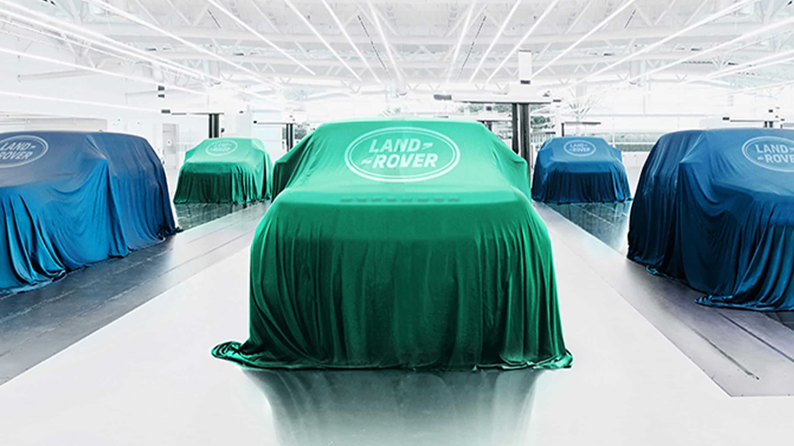 Car covered with a cloth in the showroom