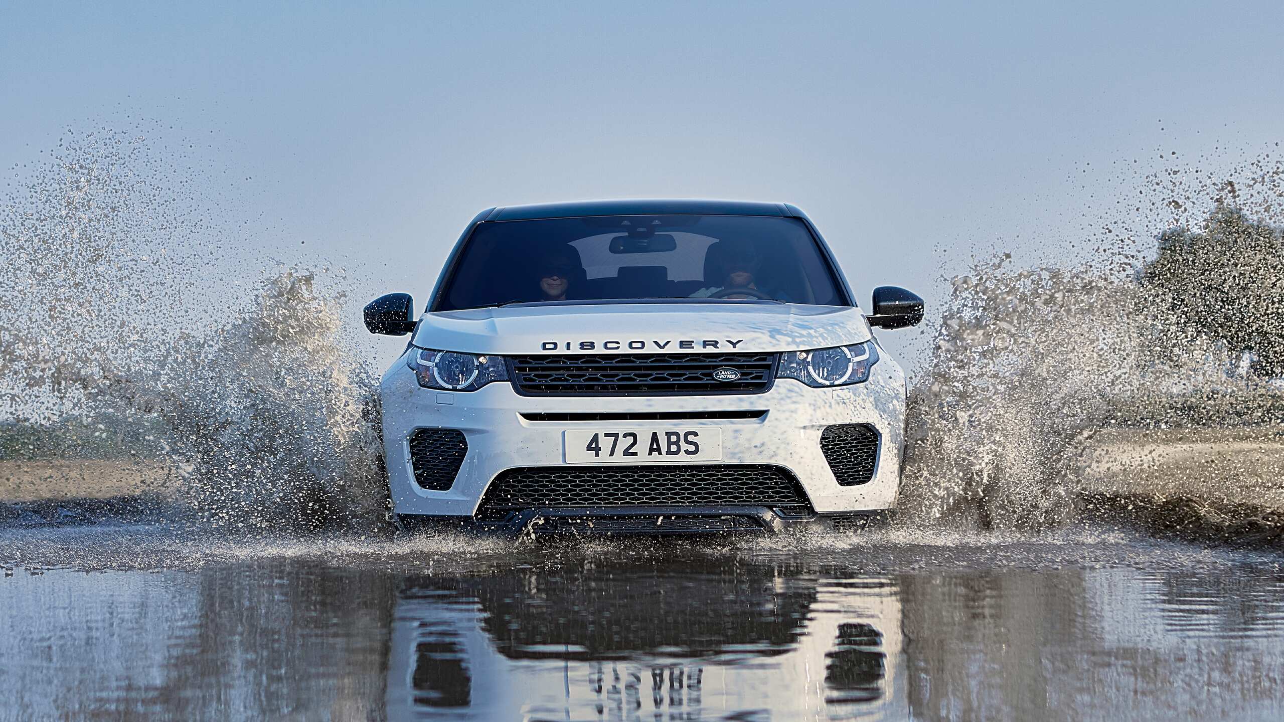 Land Rover Discovery wading in water 